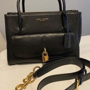 Black leather crossbody or hand bag . Never used